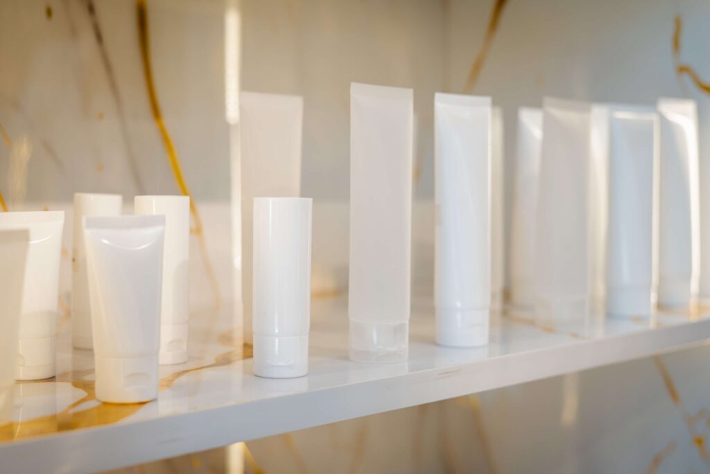 Plastic face wash tubes with flip top caps for cleansers and gels